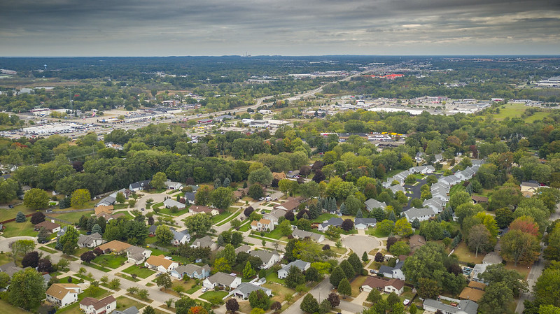 Drone photo of Holland neighborhood with leaves on the trees just starting to change color.