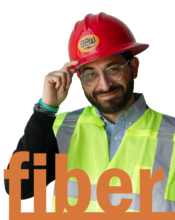 fiber logo in front of man wearing a bpw construction hat and a safety vest